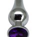 Серебристая анальная пробка с фиолетовым кристаллом - 9,4 см.