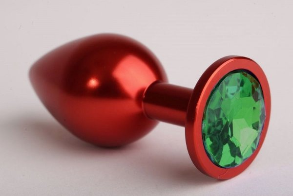 Красная анальная пробка с зеленым стразом - 7,6 см