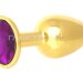 Золотистая анальная пробка с фиолетовым кристаллом - 7 см.