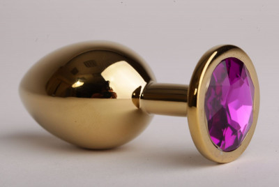 Золотистая анальная пробка с фиолетовым кристаллом - 8,2 см