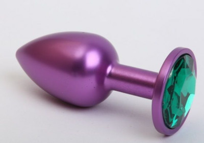 Фиолетовая анальная пробка с зеленым стразом - 7,6 см