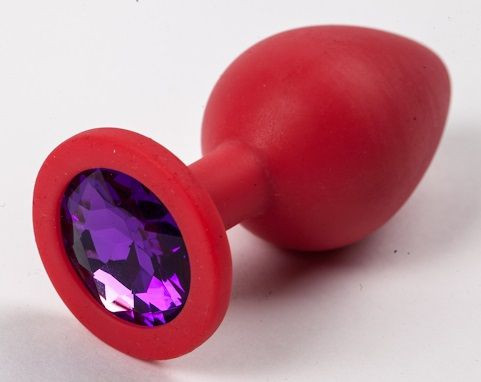 Красная силиконовая анальная пробка с фиолетовым стразом - 8,2 см