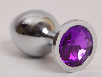 Серебристая анальная пробка с фиолетовым стразом - 9,5 см