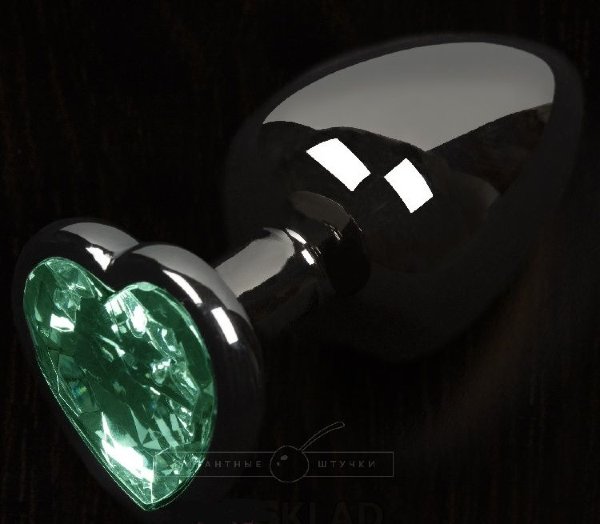 Графитовая анальная пробка с зеленым кристаллом в виде сердечка - 6 см.